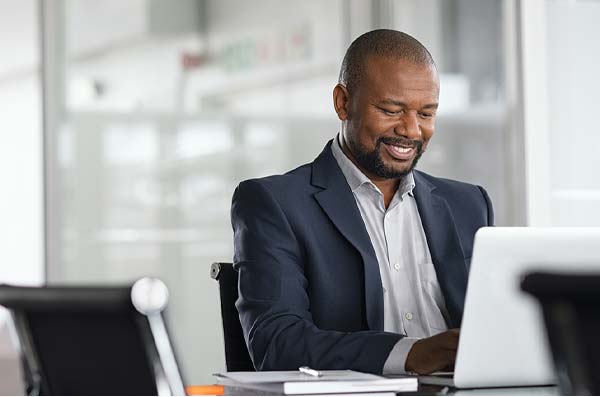 businessman banking from home office